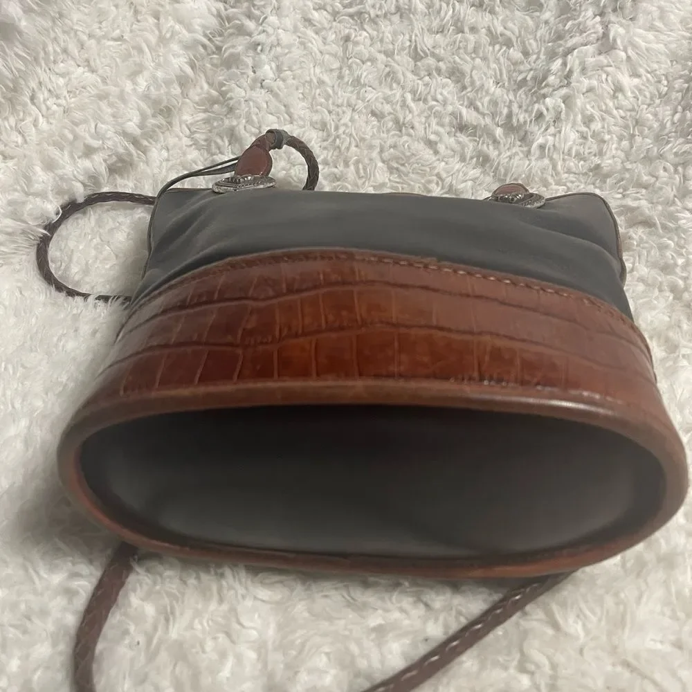 Brighton leather Black and Brown crocs print bucket style shoulder bag .